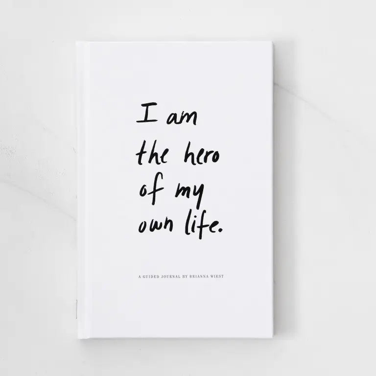 white hardcover guided journal by brianna wiest for healing and personal transformation