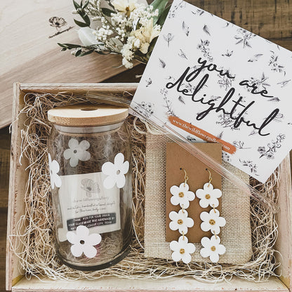 handcrafted wooden gift box with daisy glass jars and white daisy clay earrings and a glass straw. Perfect thoughtful gift for any special occasion.